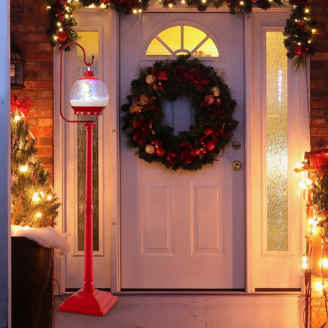 HolidayPost – 68 Inch Christmas Lantern with Magical Snow Globe