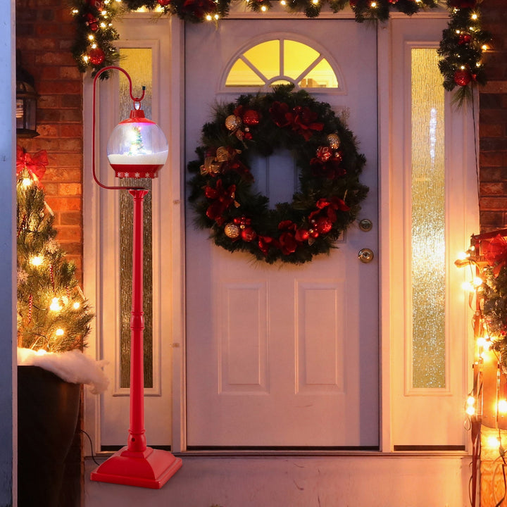 HolidayPost – 68 Inch Christmas Lantern with Magical Snow Globe