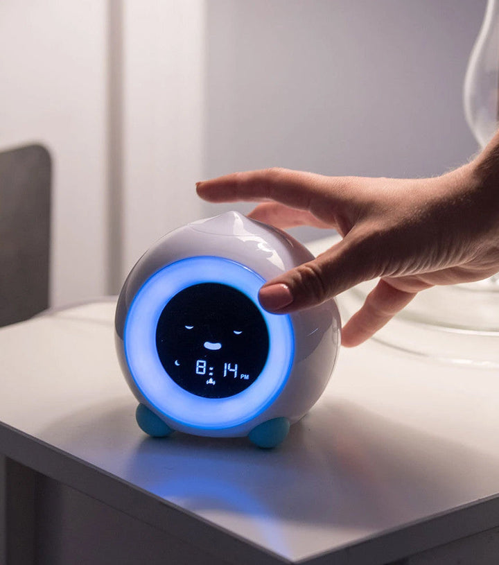 SleepBuddy Interactive Sleep Trainer for Children - Combines Sleep Training, Night Light, and White Noise Machine - Cute Facial Expressions - 3 Soothing Alarm Sounds