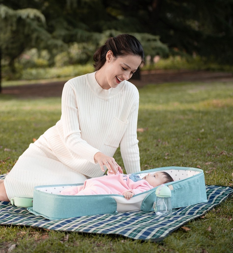 Luxury Baby Bag - multifunctional diaper bag and baby crib - 10 spacious pockets for ultimate organization - adjustable strap and two-way zipper -